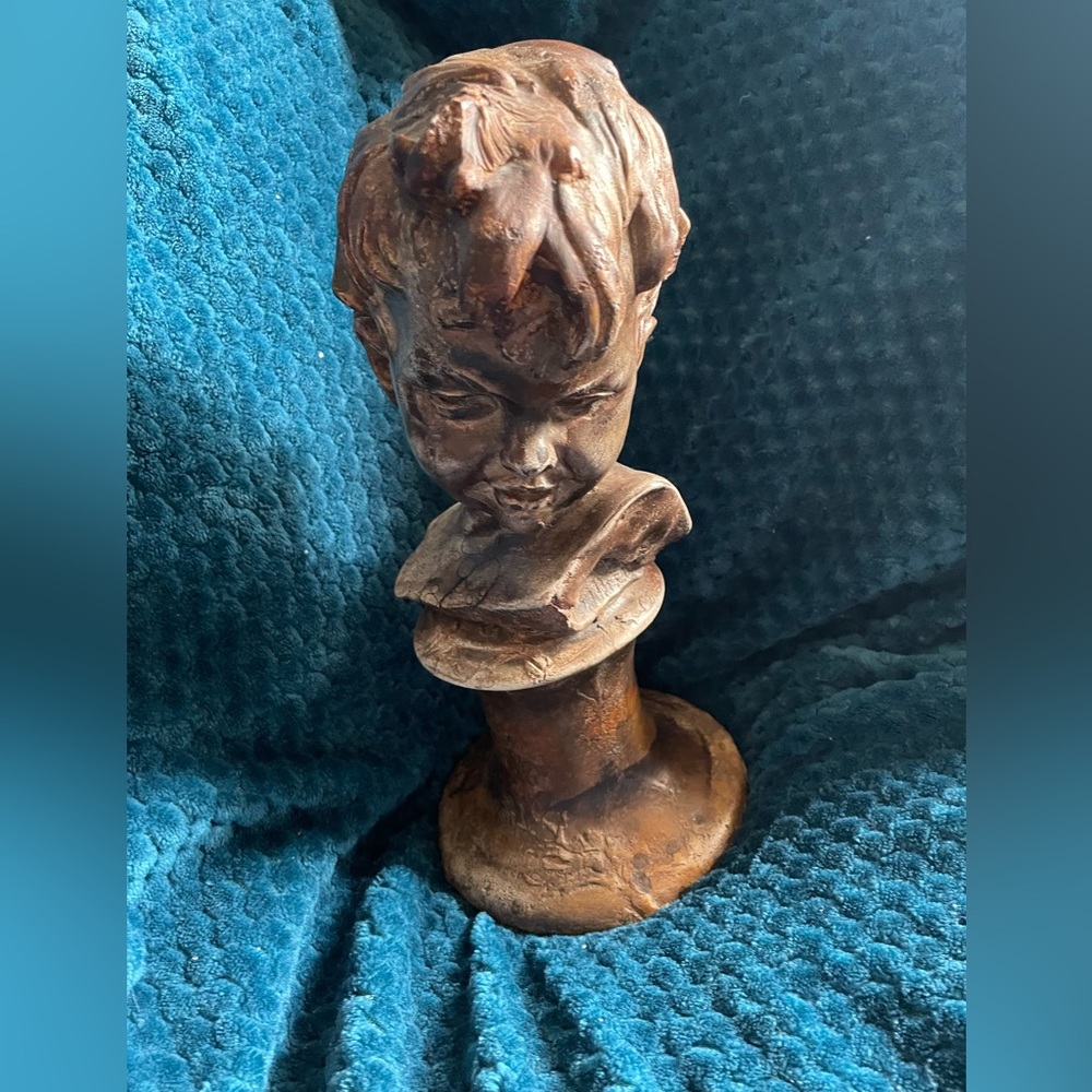 Vintage boy statue